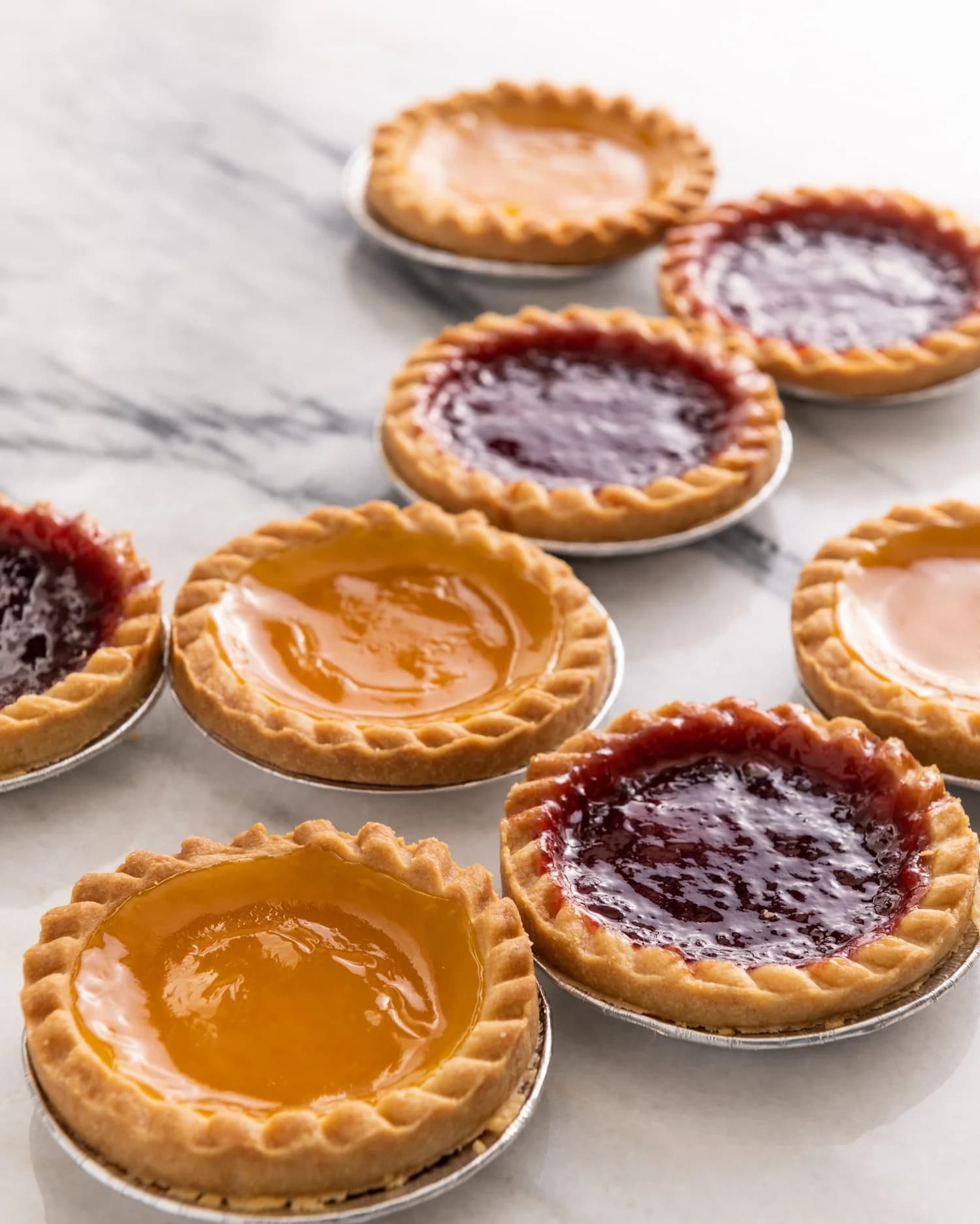 Jam tarts with apricot and raspberry filling